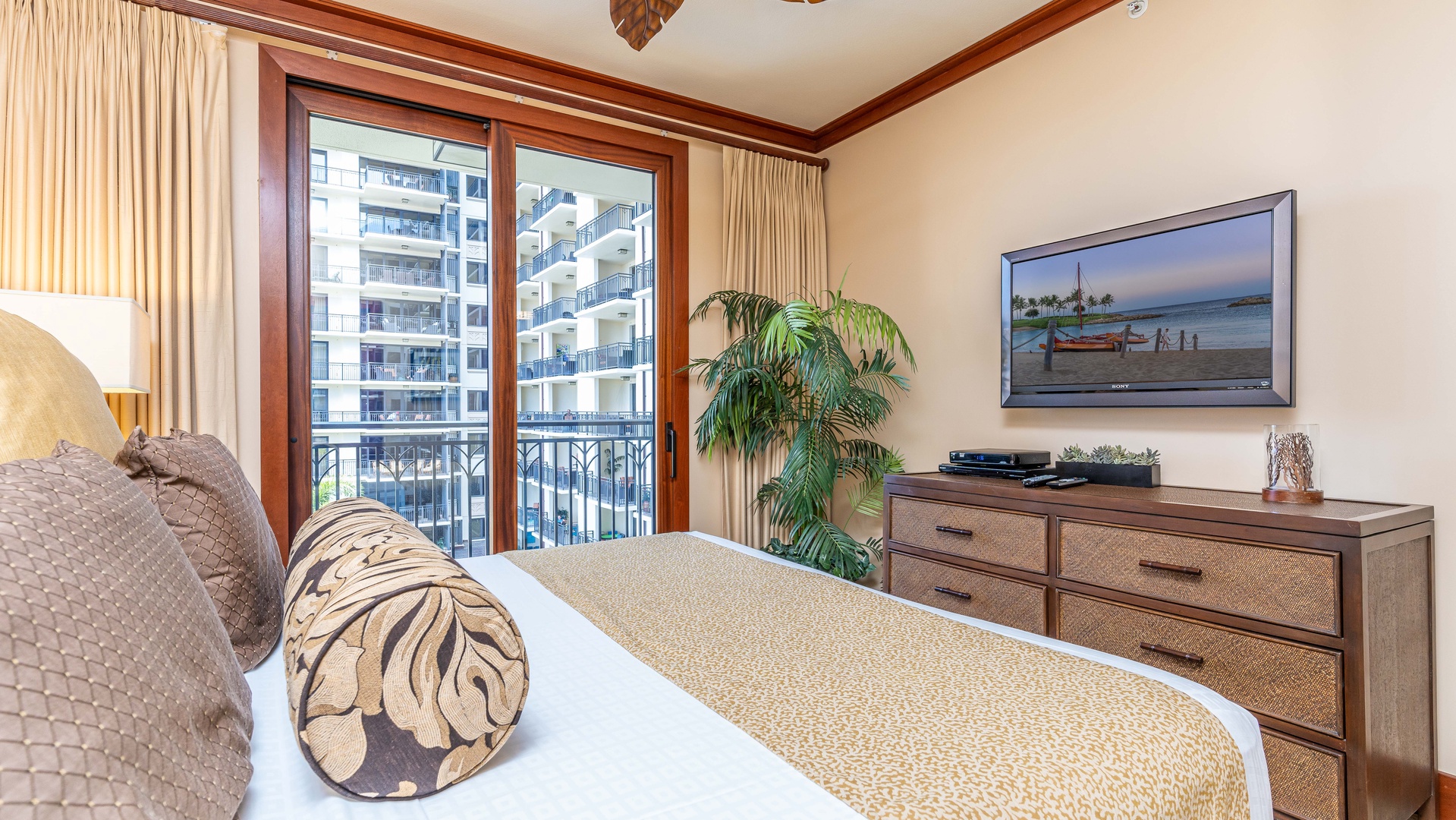 Kapolei Vacation Rentals, Ko Olina Beach Villas O521 - The primary bedroom also offers extra storage and TV.