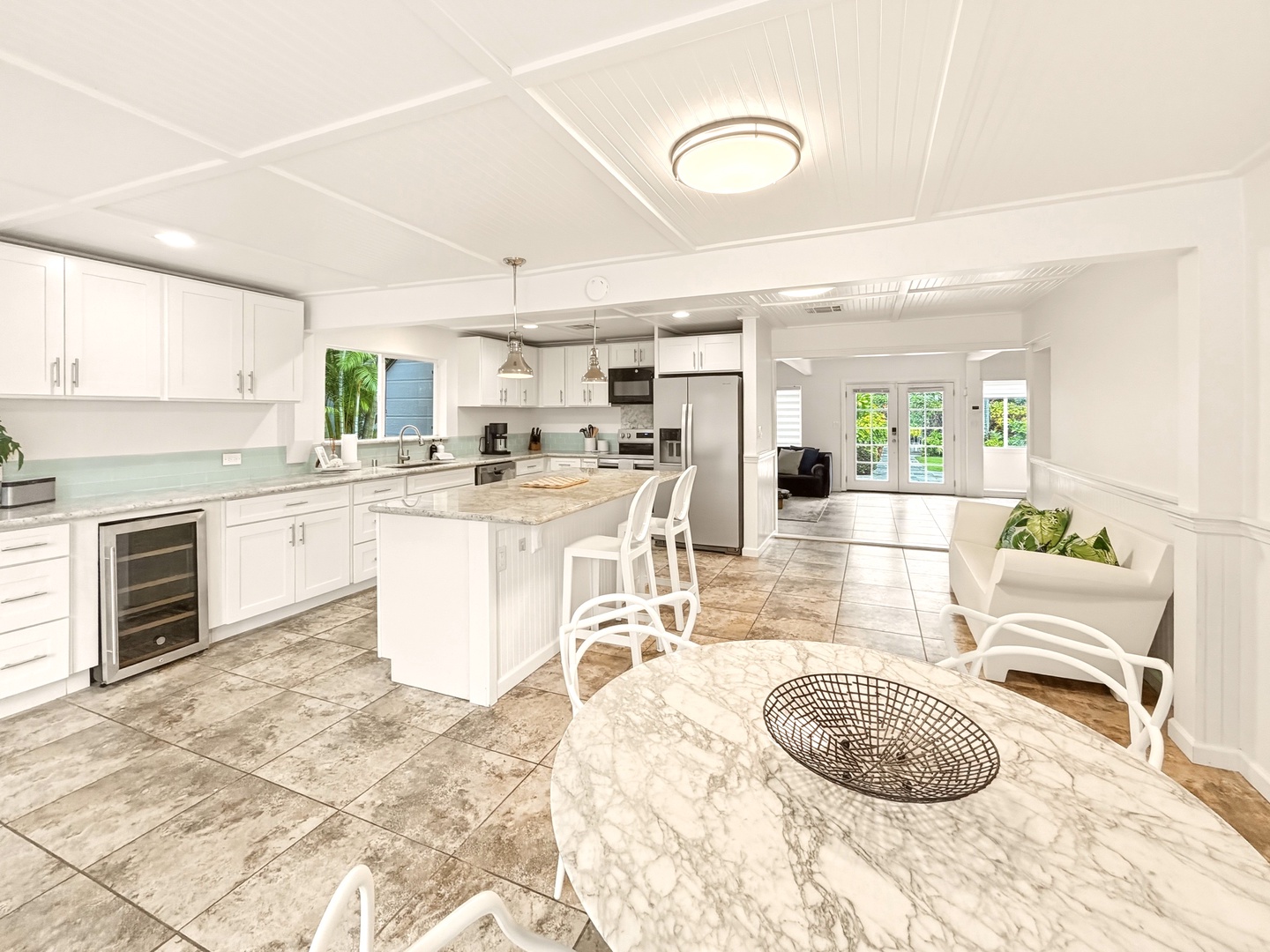 Honolulu Vacation Rentals, Ho'okipa Villa - Your spacious open-plan kitchen flows into a bright living area, perfect for gathering with loved ones over home-cooked meals.