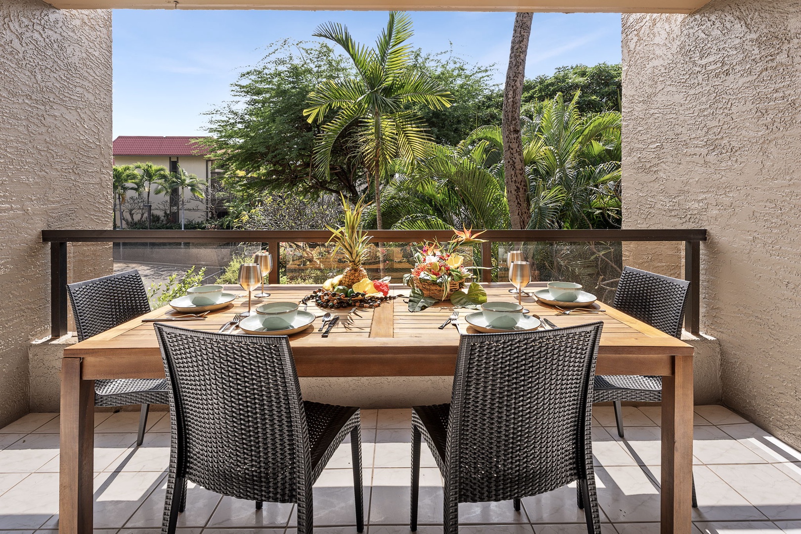 Kailua Kona Vacation Rentals, Kona Pacific C416 - Private patio dining area perfect for enjoying meals under the sky.