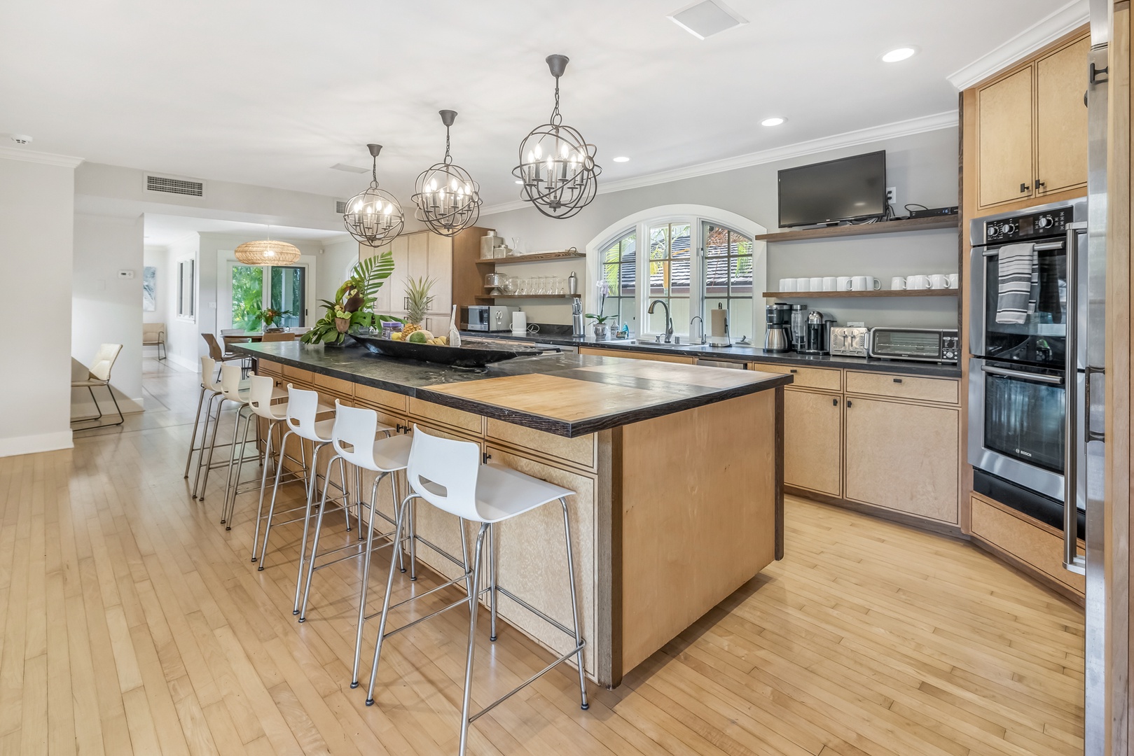 Honolulu Vacation Rentals, Moana Lani - Bright kitchen design with modern lighting and plenty of counter space.