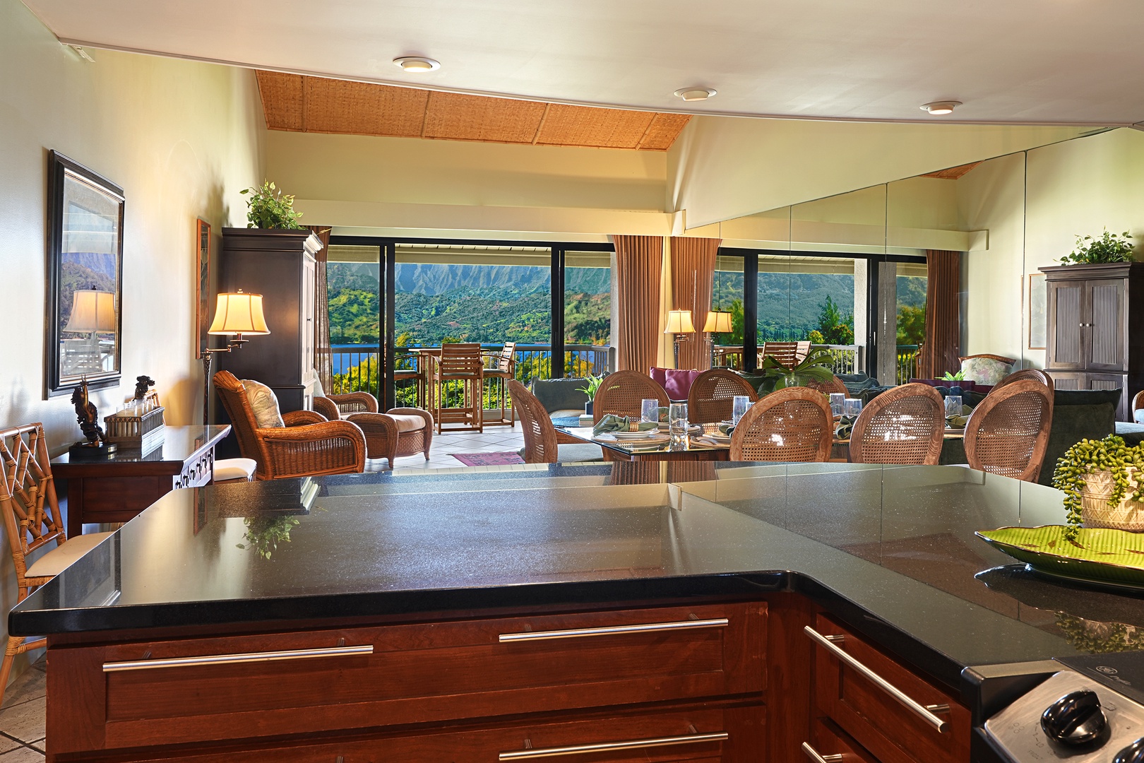 Princeville Vacation Rentals, Hanalei Bay Resort 4302/3 - Prepare meals while enjoying panoramic views from the open-concept kitchen and dining area.