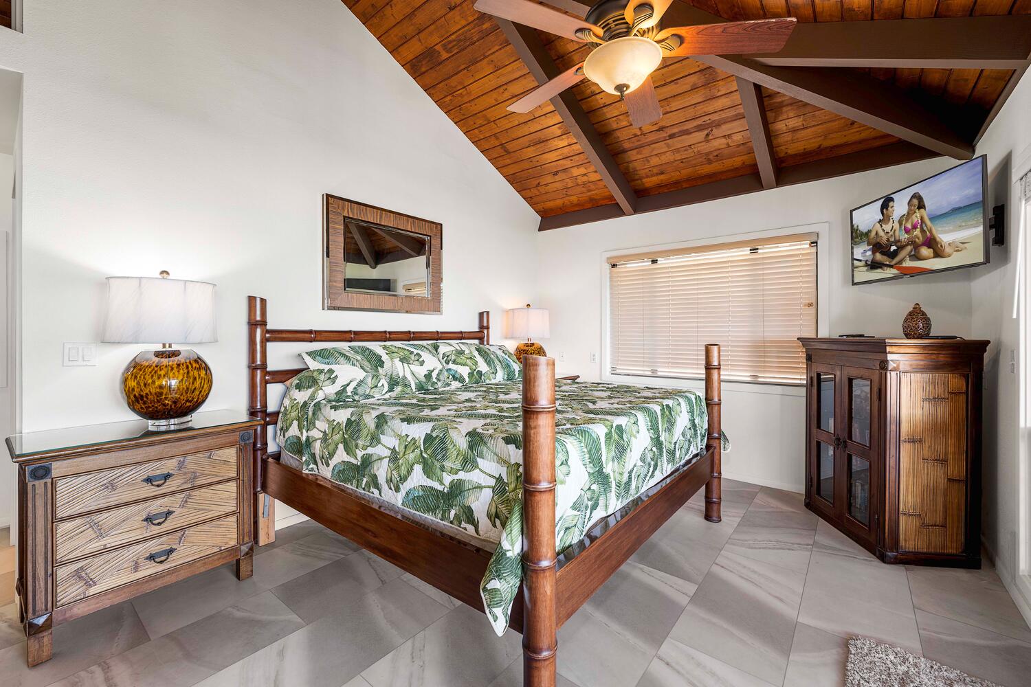 Kailua Kona Vacation Rentals, Kona Dreams - The upstair primary bedroom has a king-sized bed, private lanai, AC and TV.