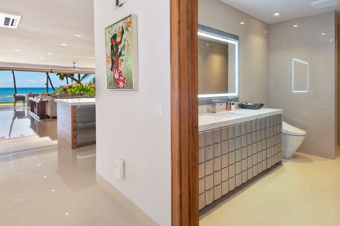 Honolulu Vacation Rentals, Diamond Head Beachfront Estate - Stylish bathroom near main living area—convenient for guests and gatherings.