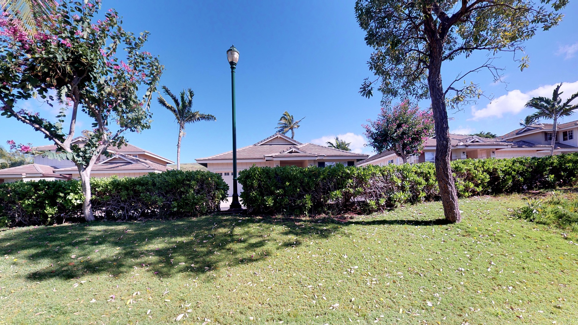 Kapolei Vacation Rentals, Ko Olina Kai 1051D - A view of the manicured lawns from the ground floor lanai.