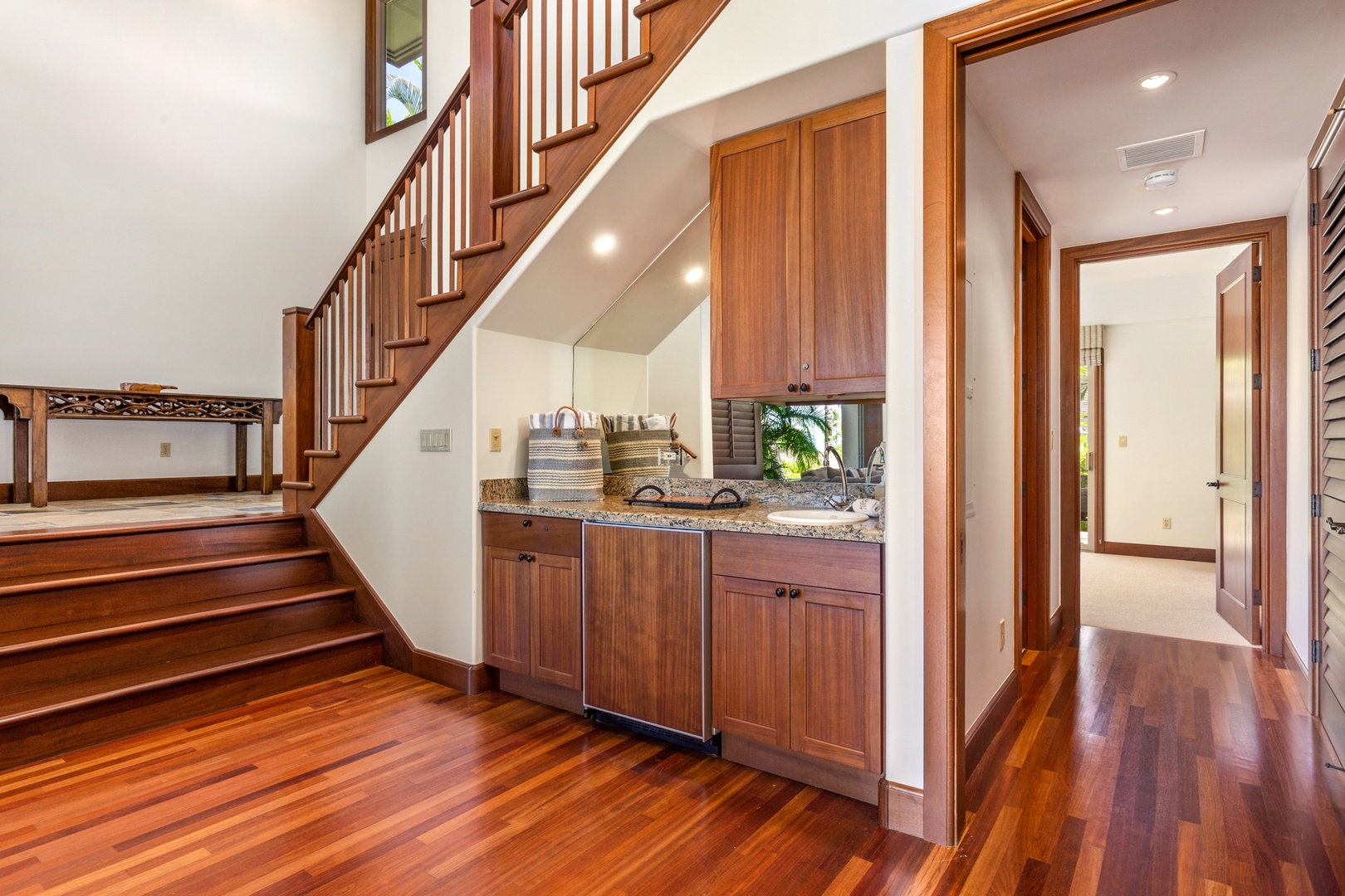 Kailua Kona Vacation Rentals, OFB 3BD Ka'Ulu Villa (129D) at Four Seasons Resort at Hualalai - Lower level staircase leading to downstairs “bonus living room”.