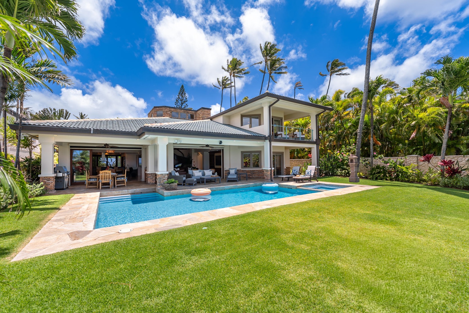 Honolulu Vacation Rentals, Maunalua Estate - Sunlit lawns and sparkling blue water set the scene for effortless island living.