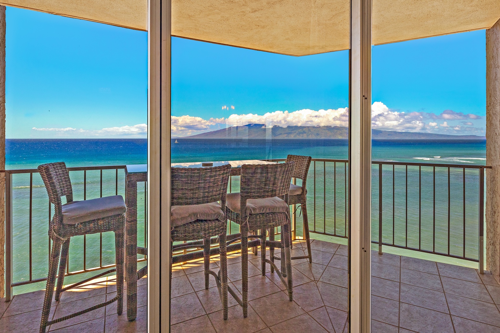 Lahaina Vacation Rentals, Royal Kahana 1010 - Step onto the lanai and enjoy panoramic ocean views, ideal for outdoor dining or simply taking in the beauty of the coastline.