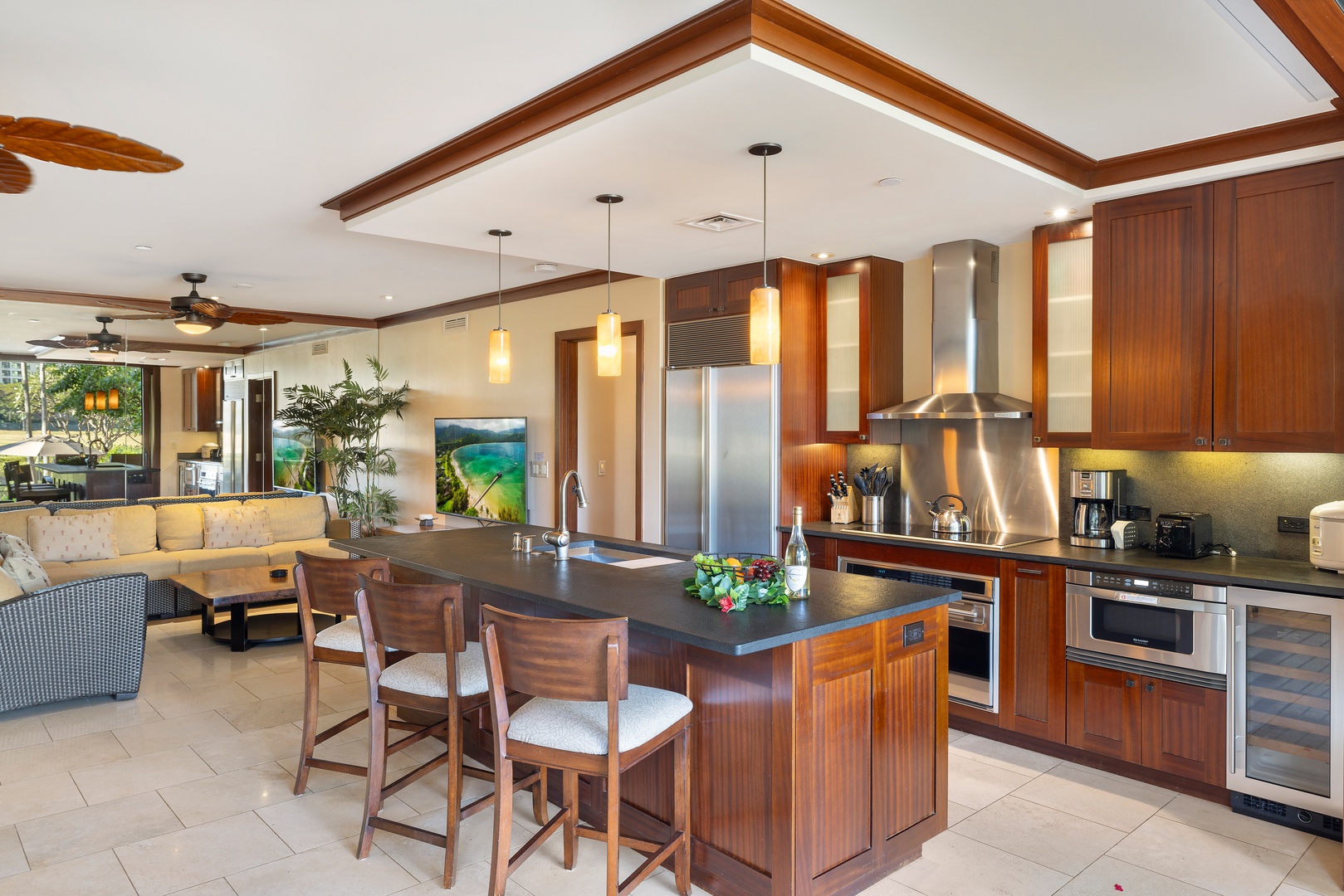 Kapolei Vacation Rentals, Ko Olina Beach Villas B107 - Alternate View of Kitchen with top of the line appliances and breakfast bar.