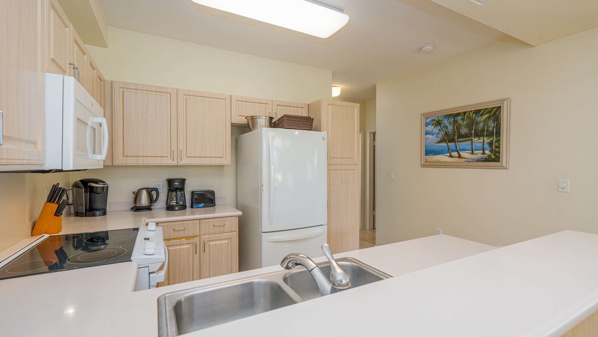Kapolei Vacation Rentals, Fairways at Ko Olina 18C - Converse with the chef and enjoy your stay.