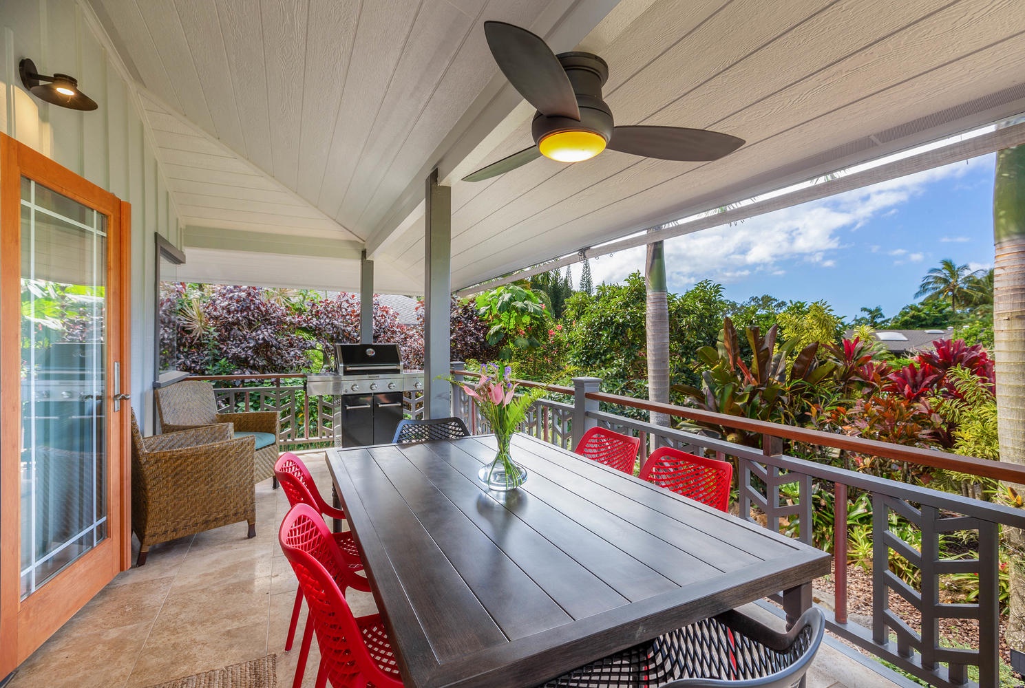 Princeville Vacation Rentals, Makana Lei - Lush garden views and outdoor seating on the lanai