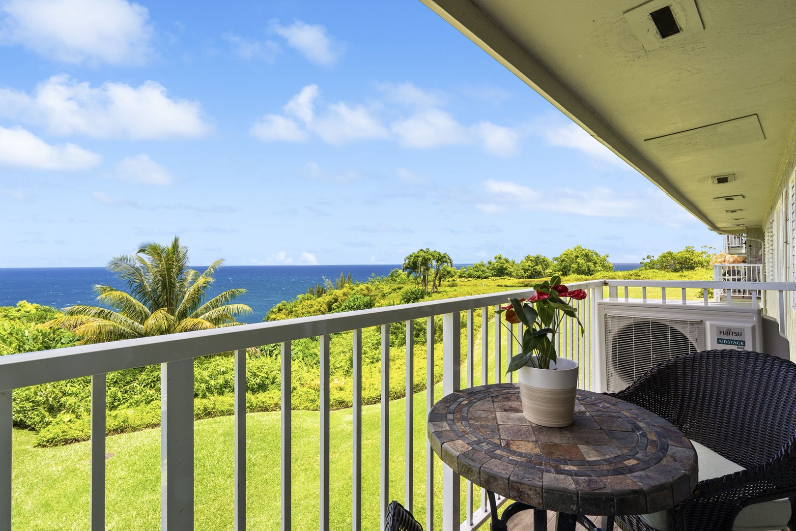 Princeville Vacation Rentals, Alii Kai 7201 - Pull a chair to the shaded lanai table and let the ocean set the pace.