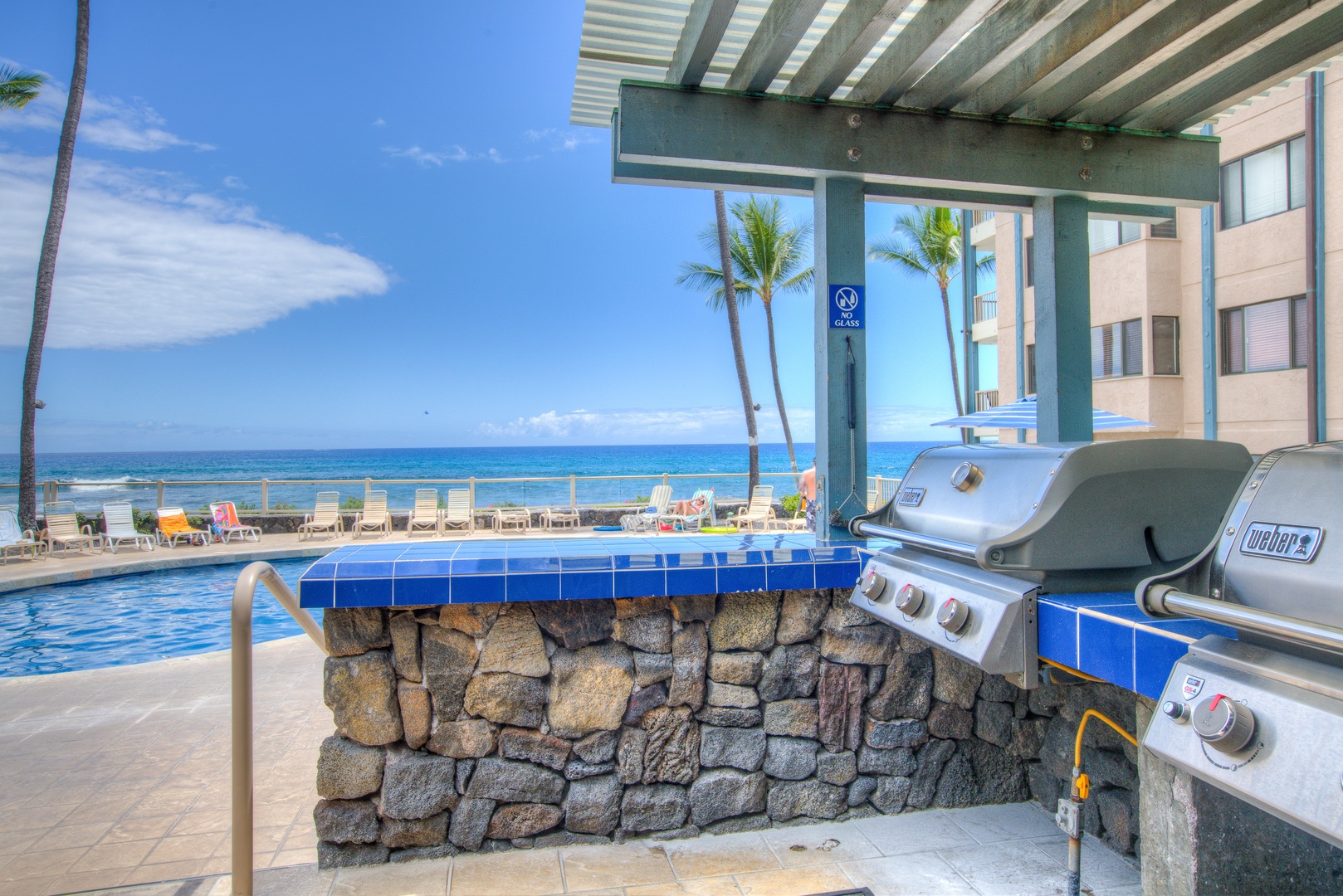 Kailua Kona Vacation Rentals, Kona Reef F11 - Lovely Oceanfront Pool Area with Spa and Barbecue Facilities.