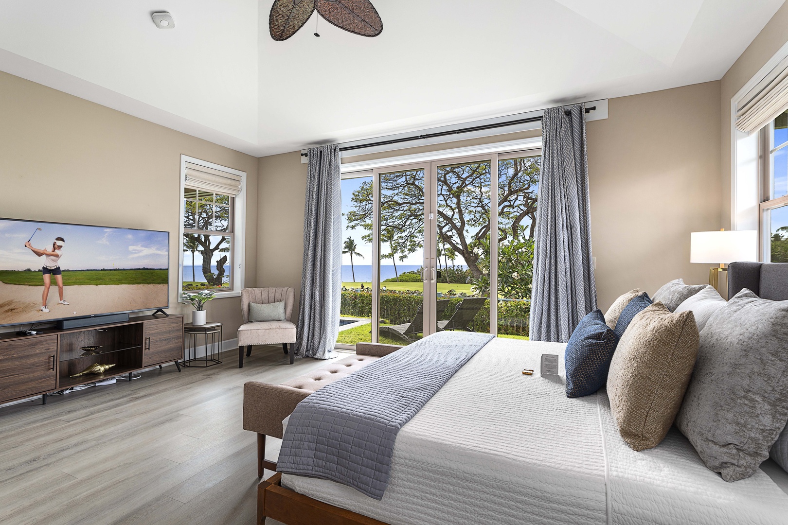 Kailua Kona Vacation Rentals, Holua Kai #27 - King bed in the primary suite, with a window desk for the mornings you can't fully log off.