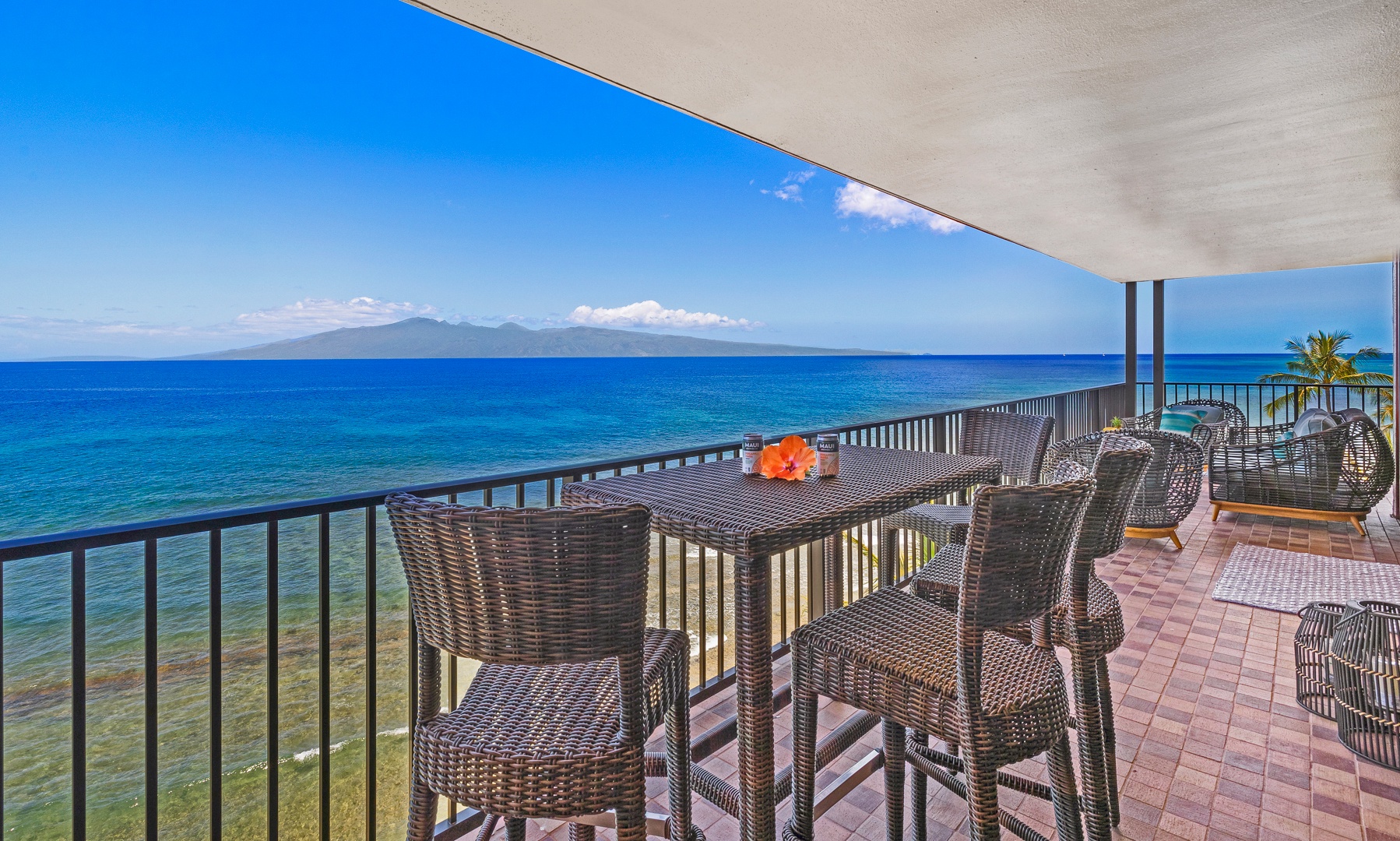 Lahaina Vacation Rentals, Kaanapali Shores 702 - Enjoy a meal or drinks on the lanai while taking in the expansive ocean views and island breezes.