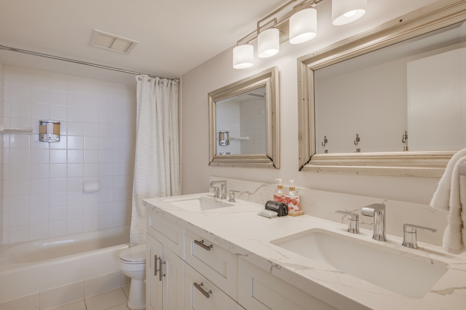 Lahaina Vacation Rentals, Kahana Villas E408 - The ensuite bath has dual vanities and a shower/tub combo.