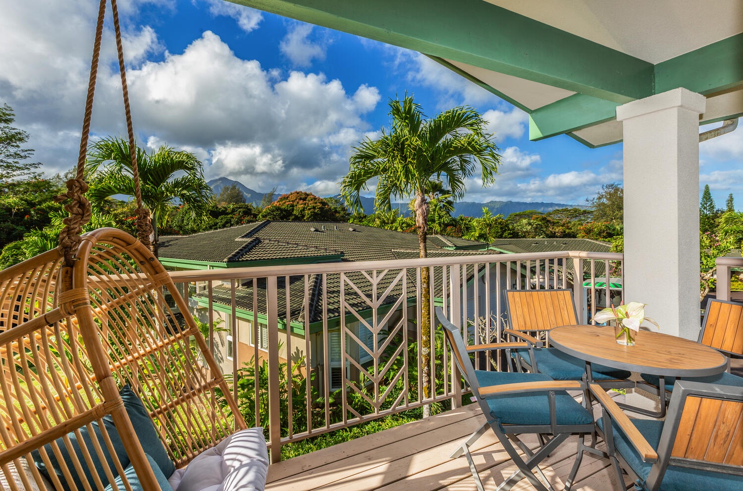 Princeville Vacation Rentals, Sea Glass - A relaxed morning in front of the scenic mountain view from the lanai, a perfect spot for a morning coffee.