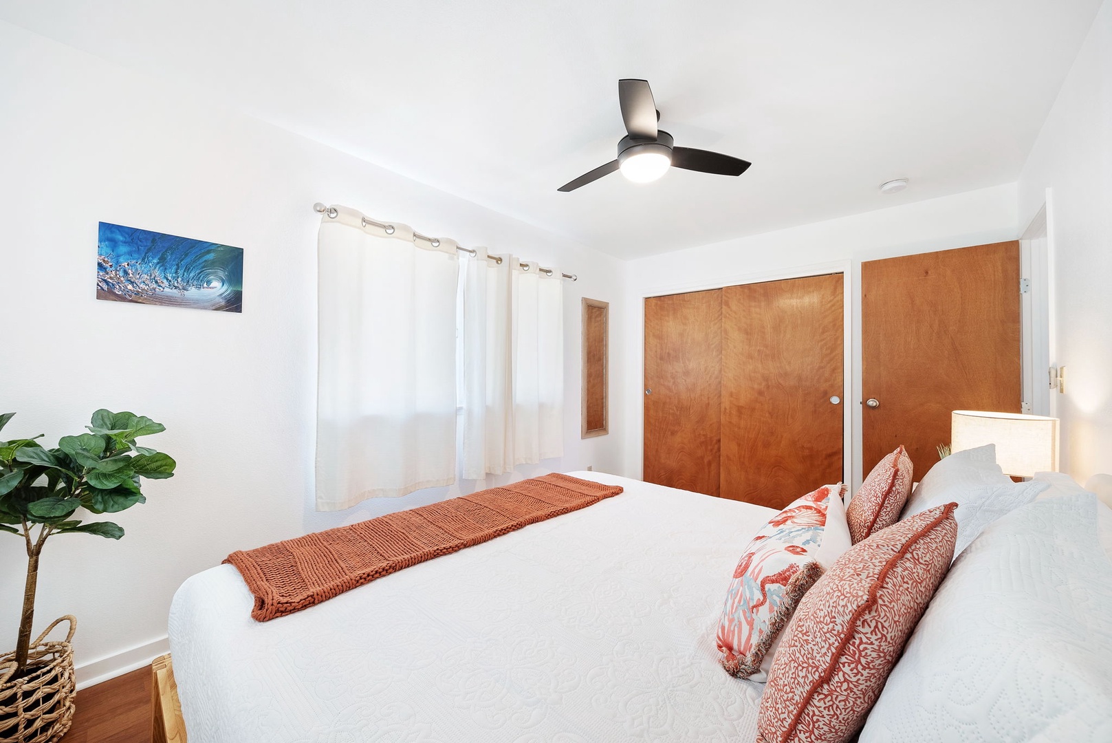 Haleiwa Vacation Rentals, Pikai Hale - Enjoy the comfort of the Primary Bedroom, equipped with a ceiling fan to keep you cool