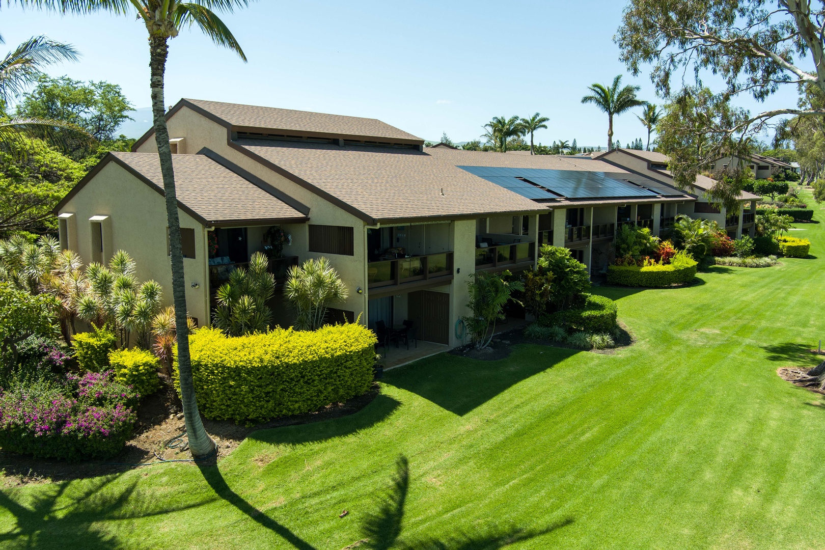 Waikoloa Vacation Rentals, Waikoloa Villas A107 - This corner unit is wrapped in greenery and features two private terraces ideal for dining, lounging, and soaking up sunshine.
