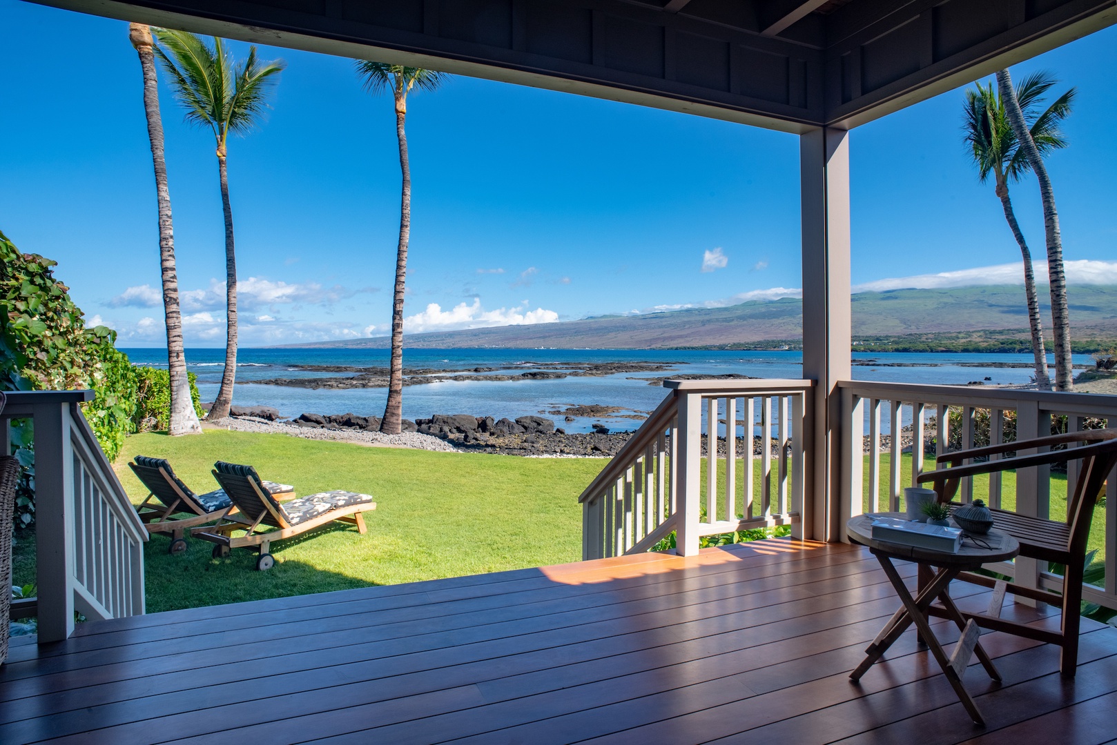 Kamuela Vacation Rentals, 3BD Estate Home at Puako Bay (10D) - Downstairs Primary Bedroom Lanai Leads Right Out to the Lawn and Ocean