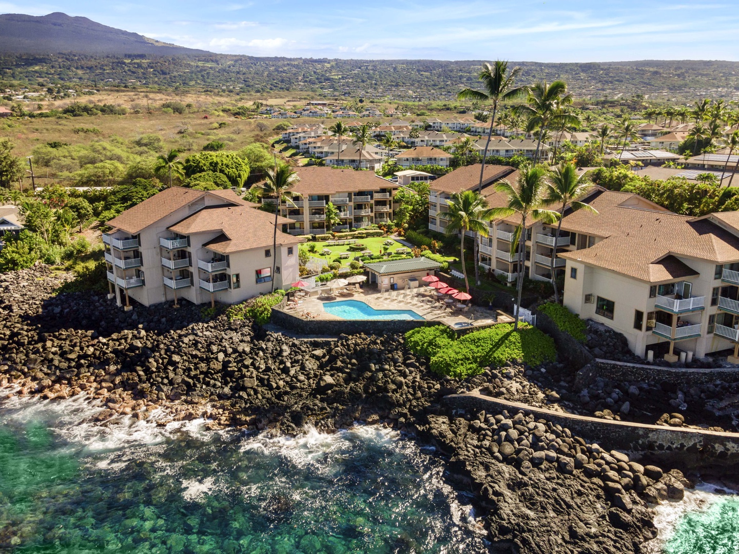 Kailua Kona Vacation Rentals, Sea Village 1105 - Enjoy gated privacy and resort-style amenities in this oceanfront complex on lava rock cliffs.