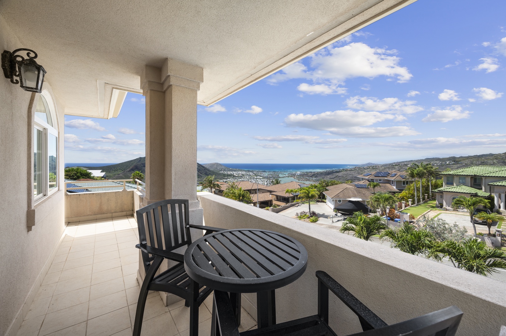 Honolulu Vacation Rentals, Lotus on a Hill* - From the Primary Bedroom, enjoy access to an expansive lanai with hightop seating as well as ocean and mountain views