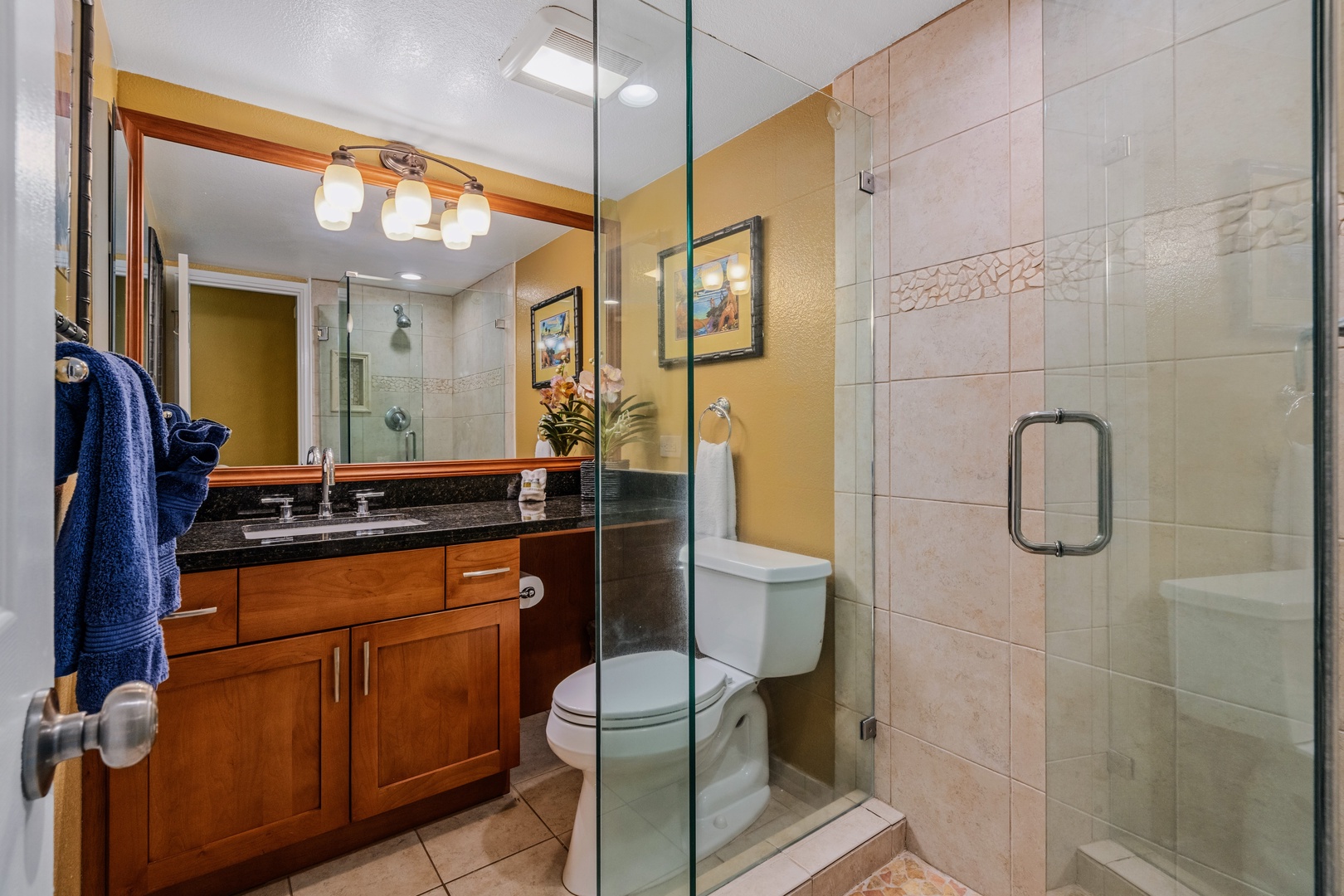 Kihei Vacation Rentals, Kamaole Sands 5310 - Rinse off after the beach in the glass-enclosed walk-in shower, pebble tile underfoot.