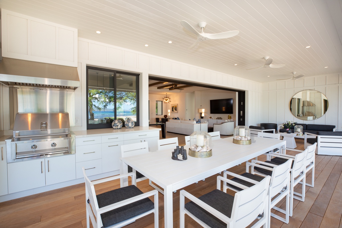 Kamuela Vacation Rentals, Puako Beach Getaway - Gather around a stylish dining table that comfortably seats eight, perfect for hearty meals and lively conversations.