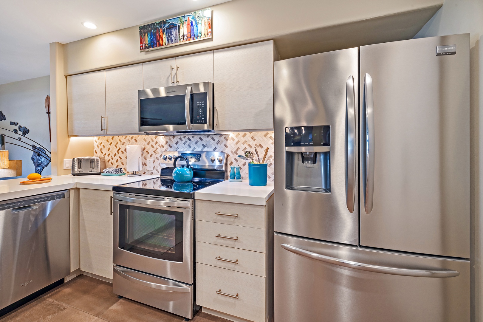 Lahaina Vacation Rentals, Kaanapali Royal Q-202 - The kitchen features stainless steel appliances and plentiful storage options.