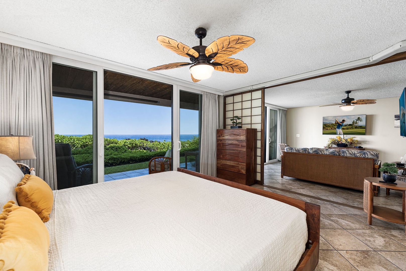 Kailua Kona Vacation Rentals, Keauhou Kona Surf & Racquet 1104 - Sliding doors bring the light and the water right up to the primary bed.