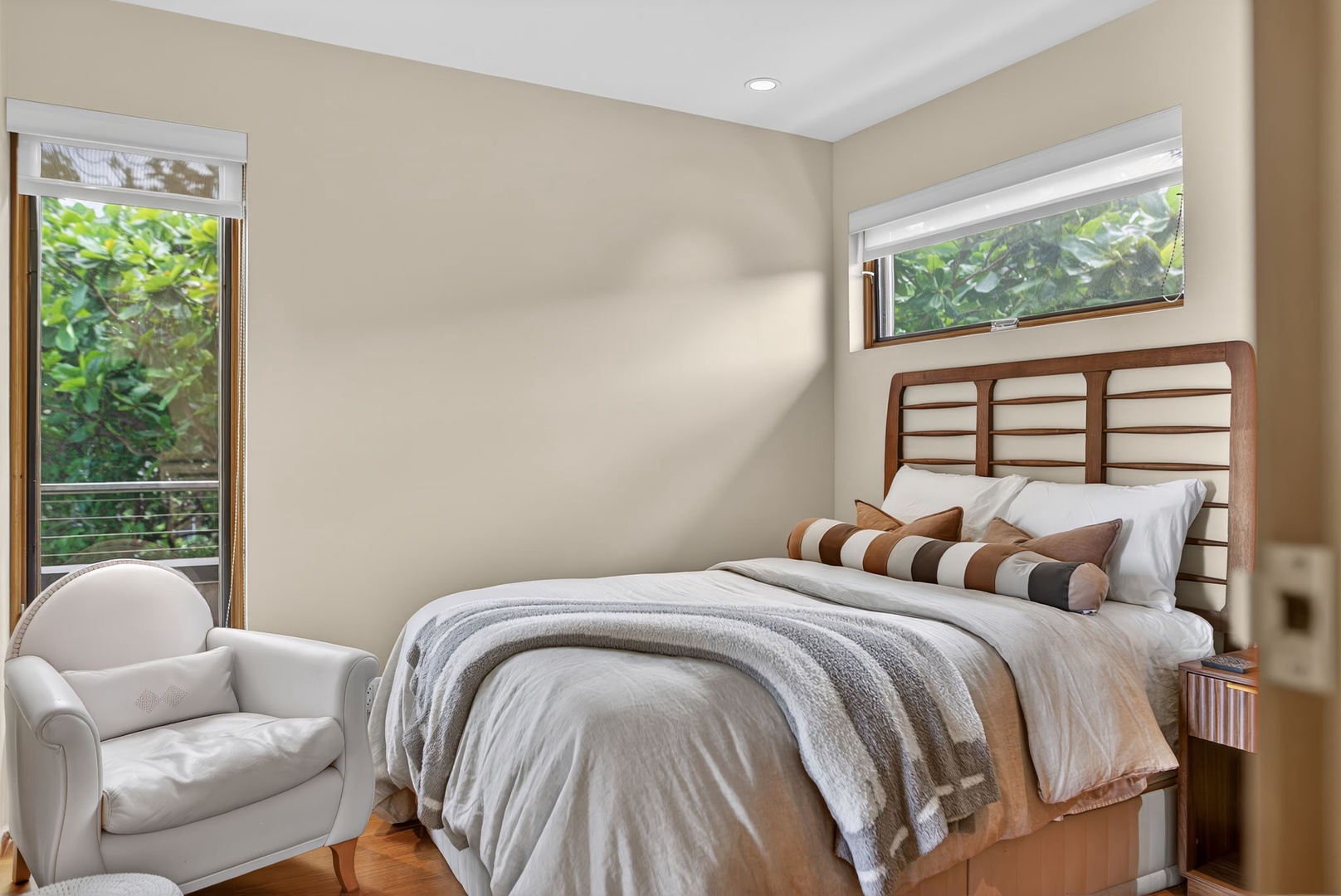 Haleiwa Vacation Rentals, HaleGator - Natural light fills this cozy guest bedroom, creating a calm and comfortable place to unwind after a day on the North Shore.