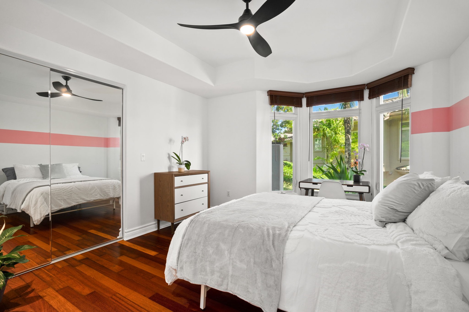 Princeville Vacation Rentals, Kaiulani #8 - Claim the bedroom with the bay window, bright enough to start the day early.