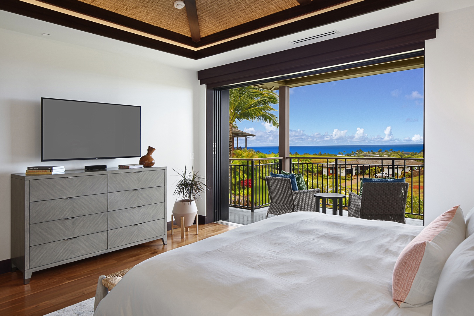 Koloa Vacation Rentals, Kainani Villa #8 - Primary bedroom with lanai and ocean views