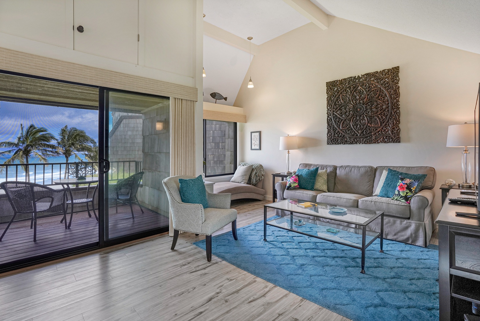 Princeville Vacation Rentals, Sealodge Villa H5 - Sliding doors open to the lanai