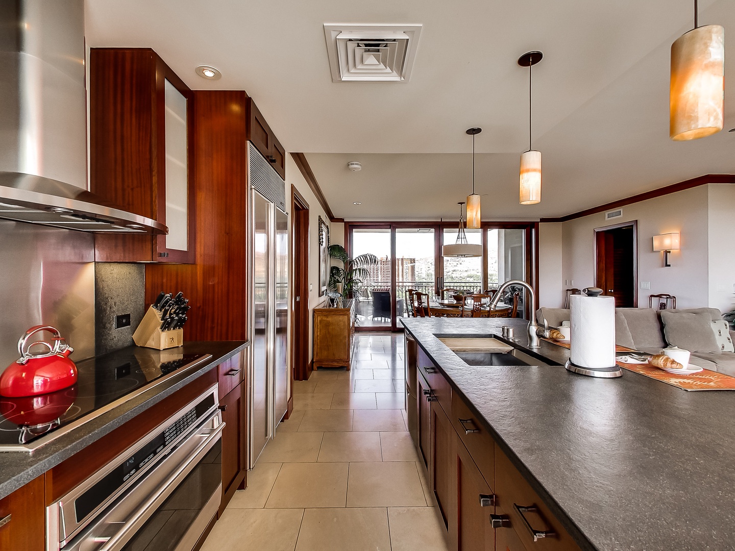 Kapolei Vacation Rentals, Ko Olina Beach Villas O1011 - The open floor plan for the kitchen, dining and living areas provide for easy conversation.