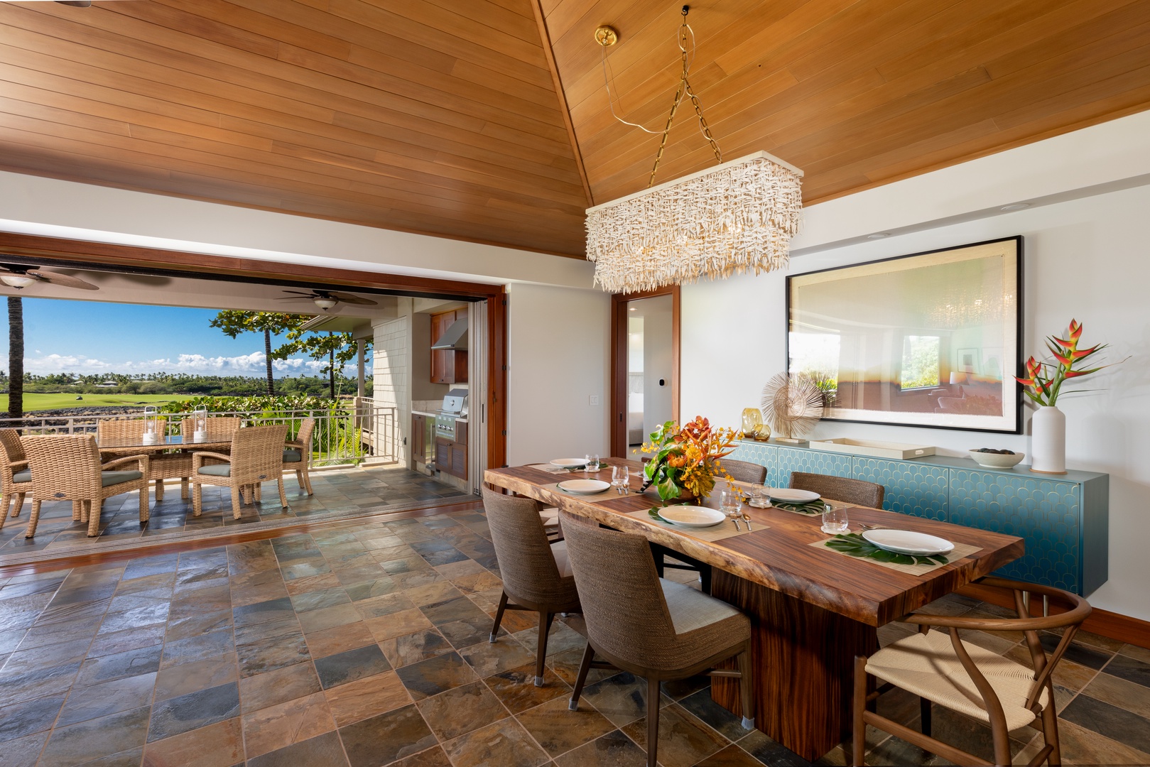 Kailua Kona Vacation Rentals, 3BD Waiulu Villa 111D at Hualalai Resort - Spacious living room with vaulted wooden ceilings, natural stone flooring, and scenic views.