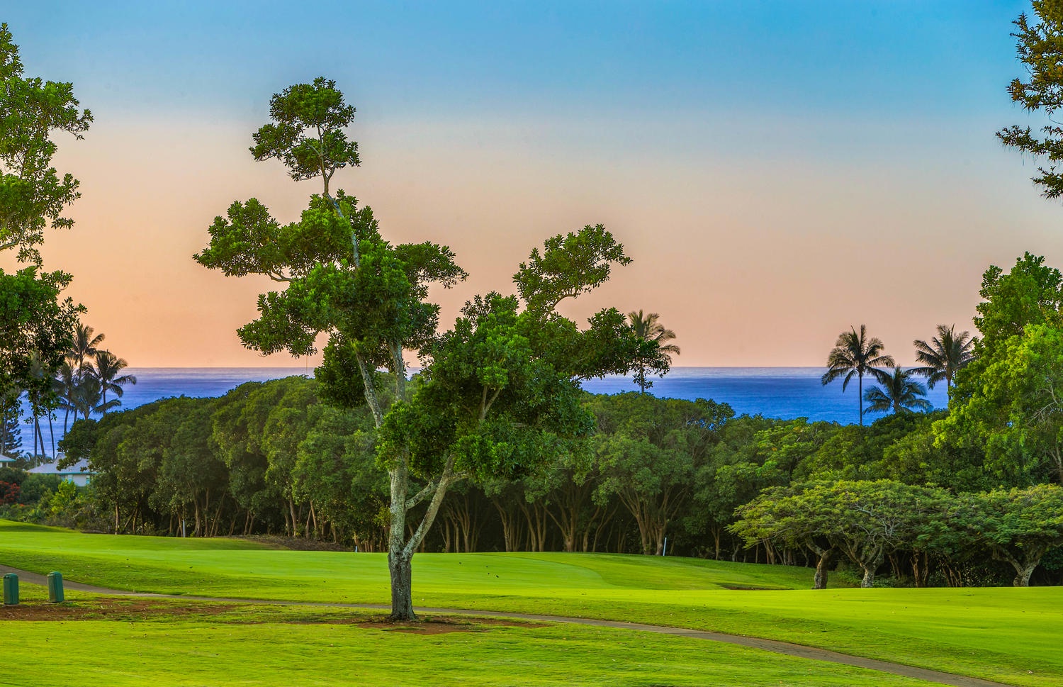 Princeville Vacation Rentals, Ohana Kamalani - Ocean, golf course and sunset view from the lanai