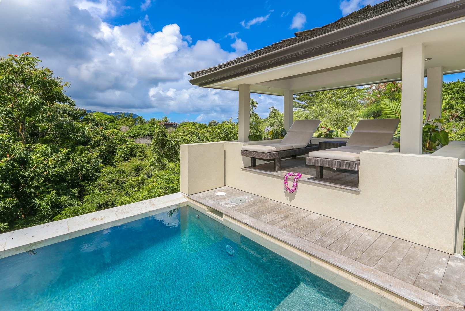 Princeville Vacation Rentals, Hanalei Plantation Villa - Take a dip under the Hawaiian sunshine and indulge in the beauty of nature vistas from the infinity pool.