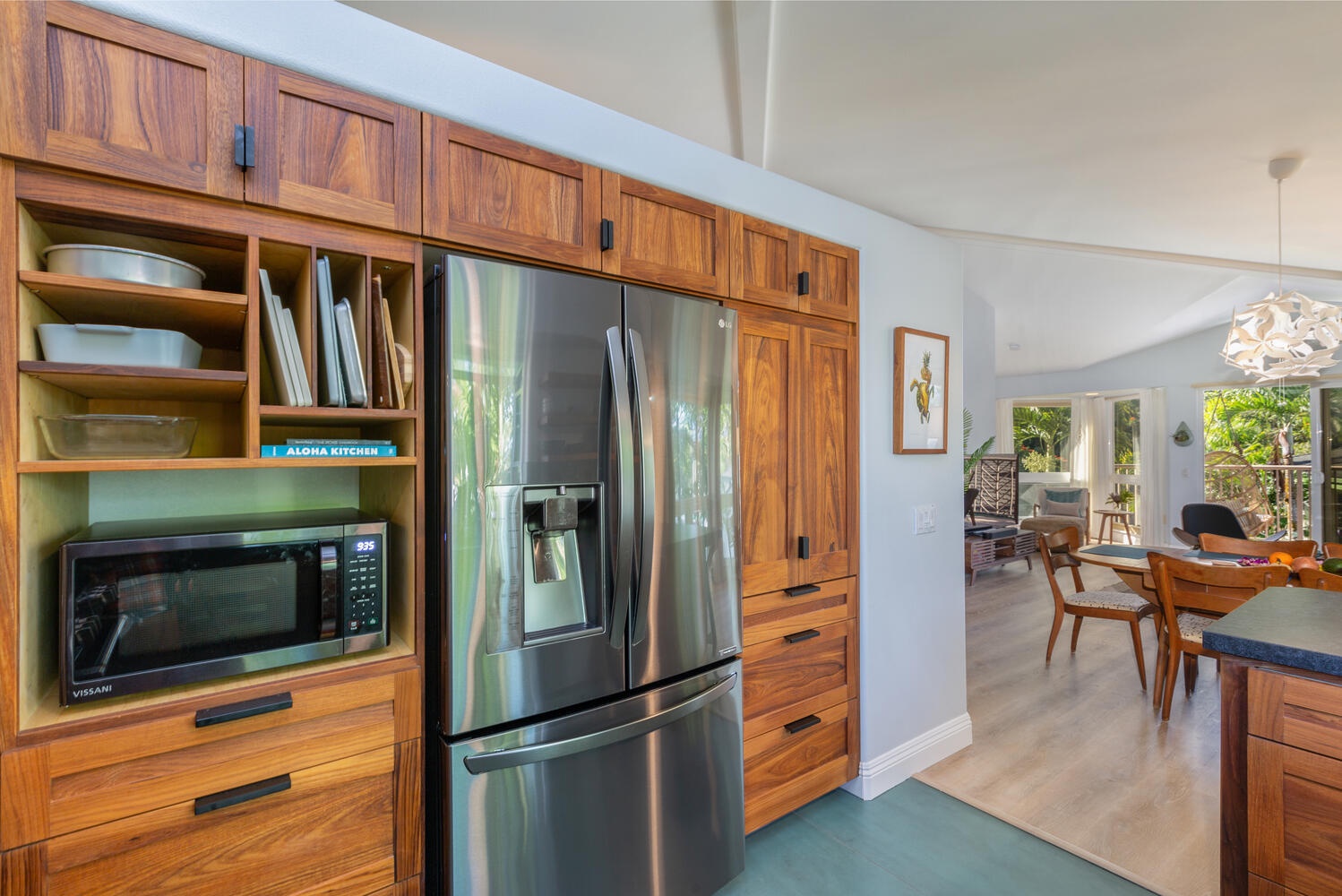 Princeville Vacation Rentals, Sea Glass - Stainless steel appliances with lots of wooden cabinetry to store your kitchen essentials.