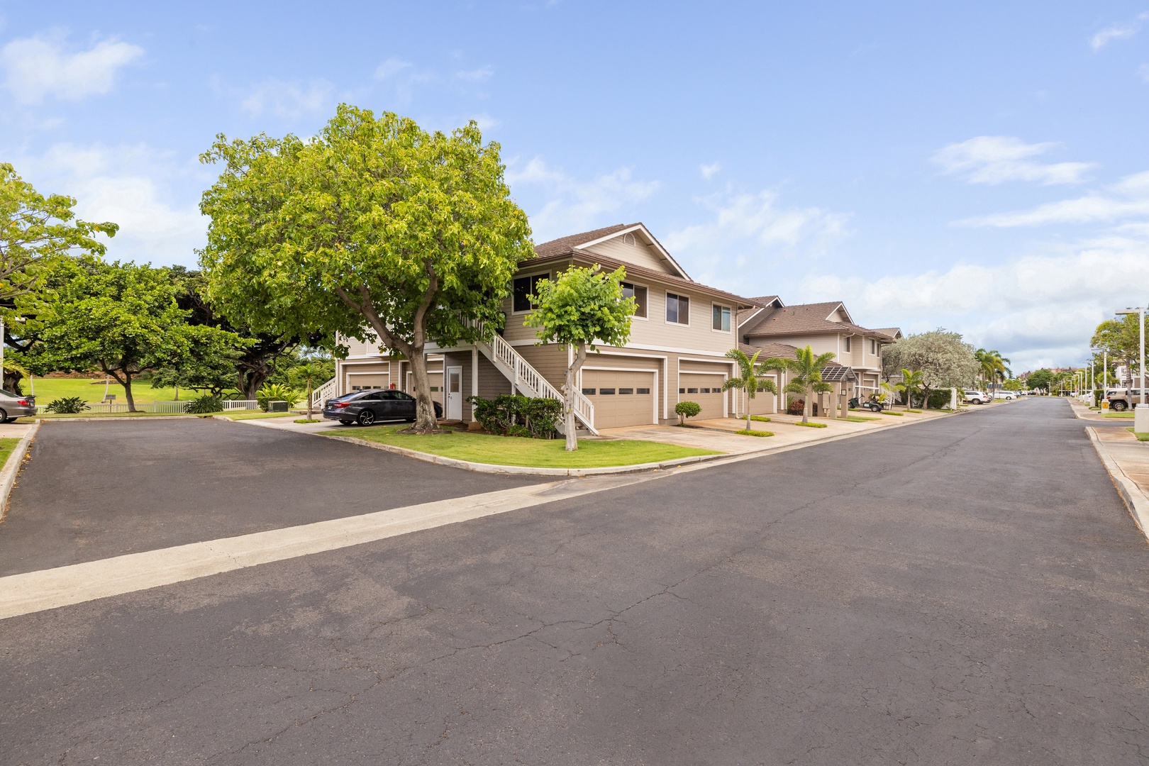 Kapolei Vacation Rentals, Fairways at Ko Olina 7A - Peaceful residential neighborhood with well-maintained homes, mature trees, and convenient parking in a quiet cul-de-sac setting.