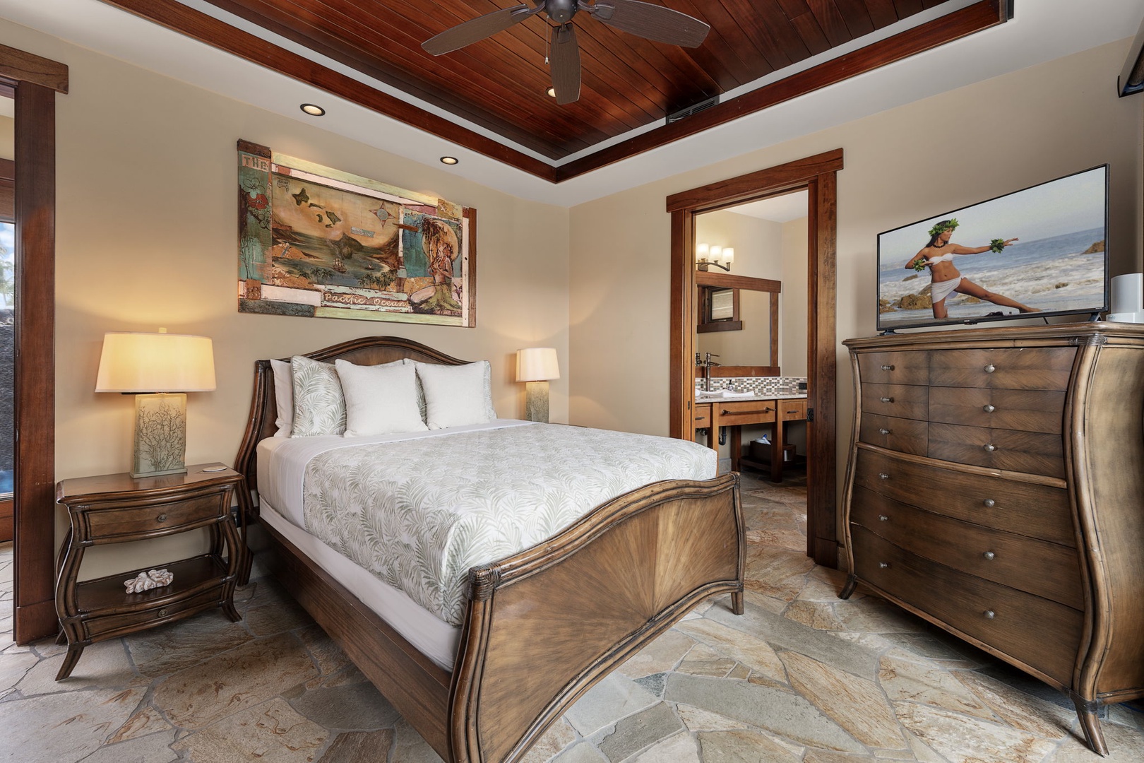Kamuela Vacation Rentals, Hale Konane - The perfect blend of comfort and island elegance in this queen suite, featuring patio access and serene garden views.