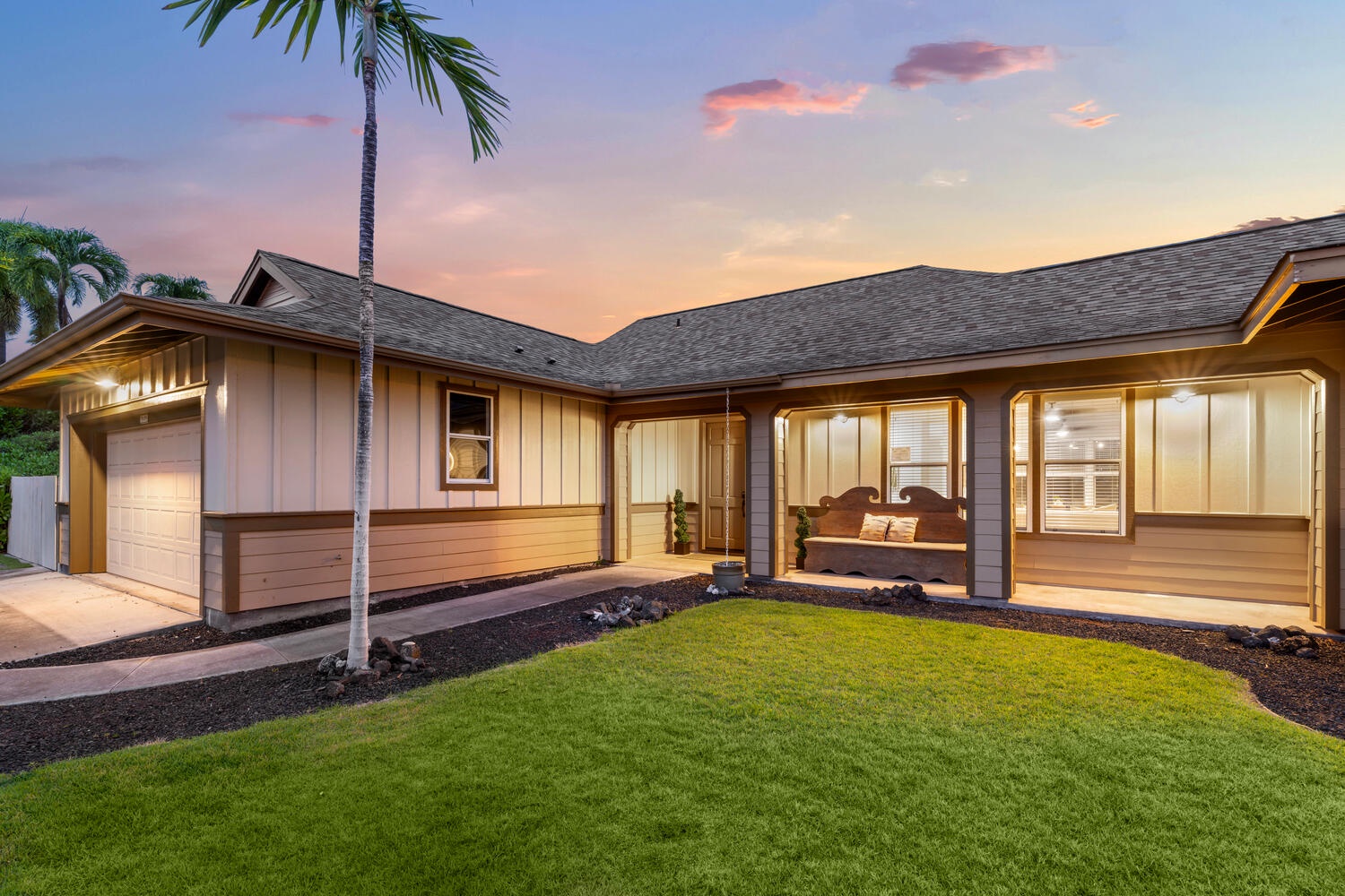 Kailua Kona Vacation Rentals, Kahakai Estates Hale - Cozy patio retreat framed by palms and sunset skies.