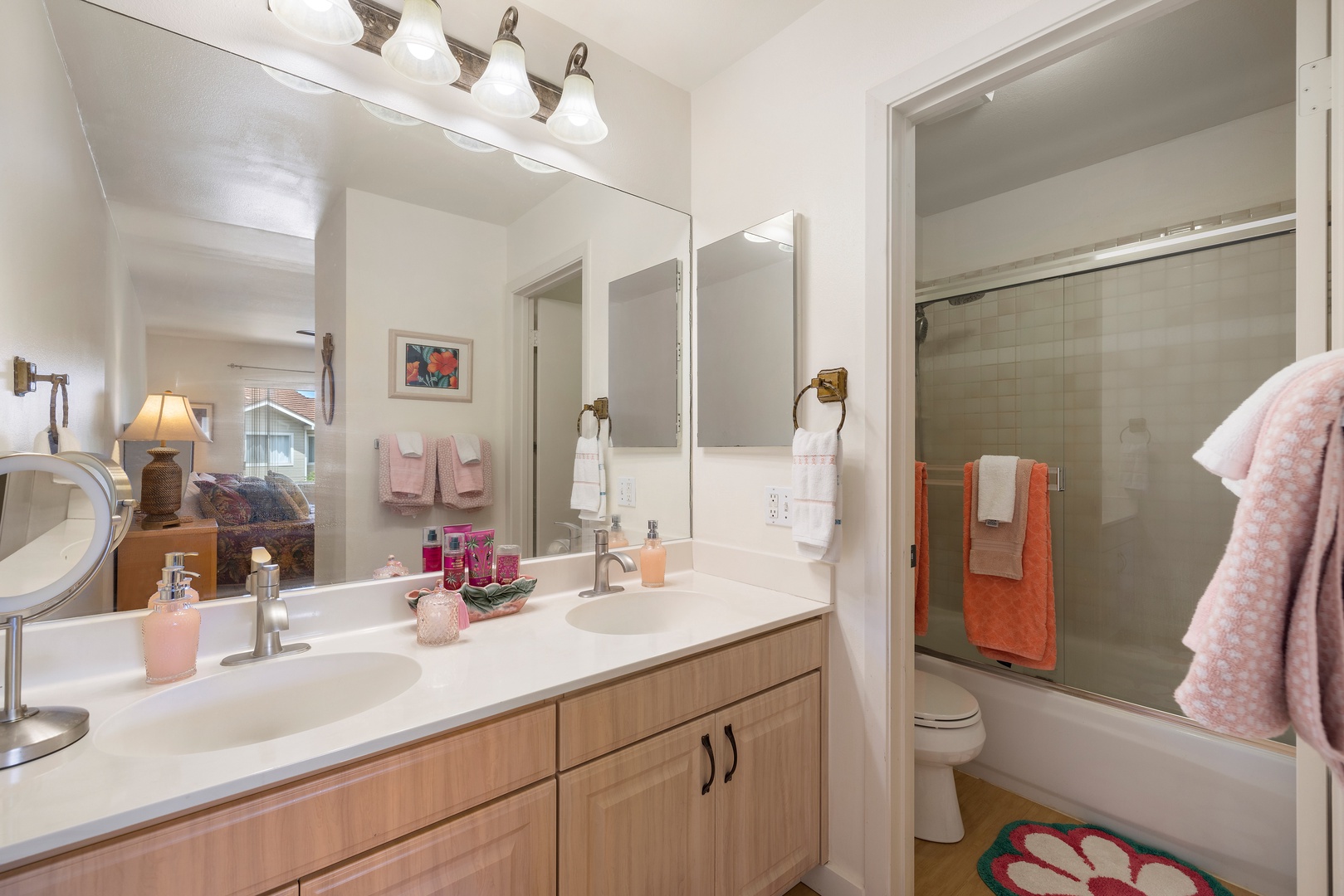 Refresh in your spacious bathroom with dual sinks, modern finishes, and a relaxing shower-tub combo perfect for unwinding after your adventures.