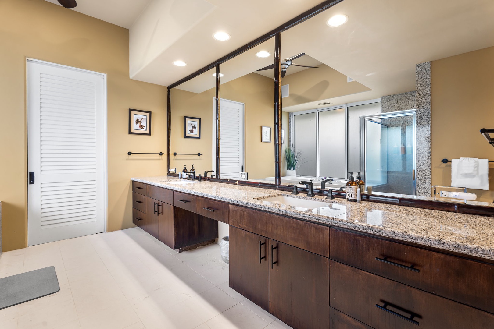 Kailua Kona Vacation Rentals, Hale Nai'a - Your spacious master bathroom features dual vanities with granite countertops, perfect for getting ready together in luxurious comfort.