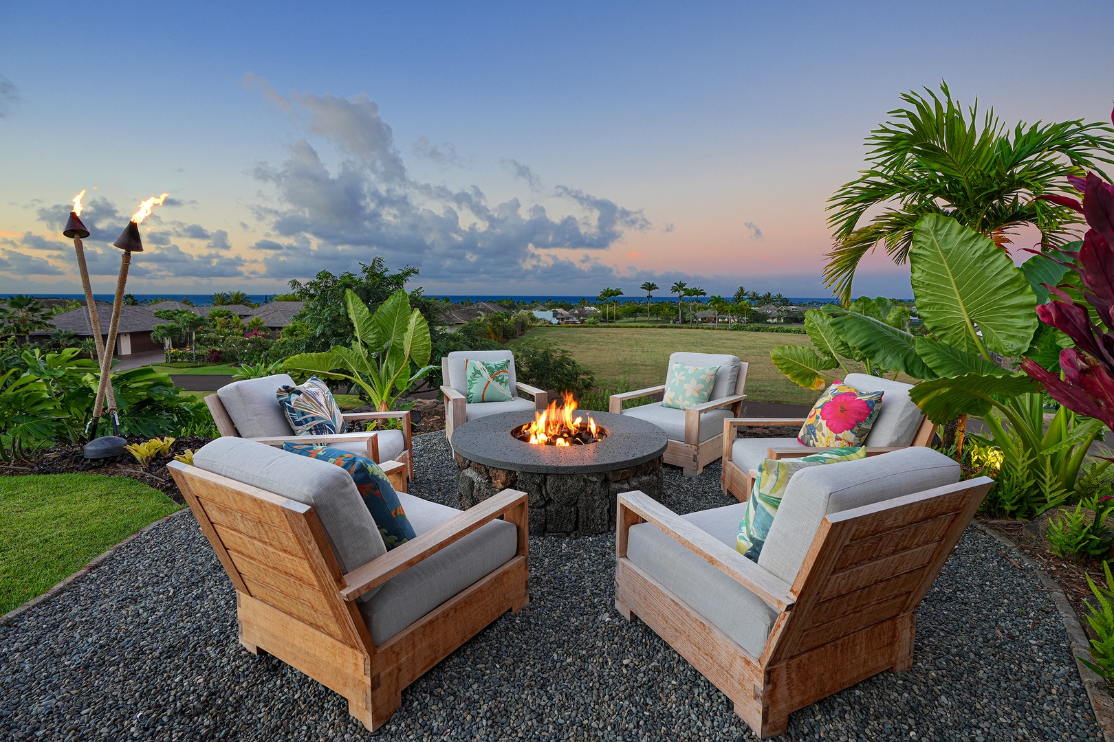 Koloa Vacation Rentals, Hale Ka Pua Ola at Kukuiula - Cozy up by the fire pit as the sun sets over the horizon.