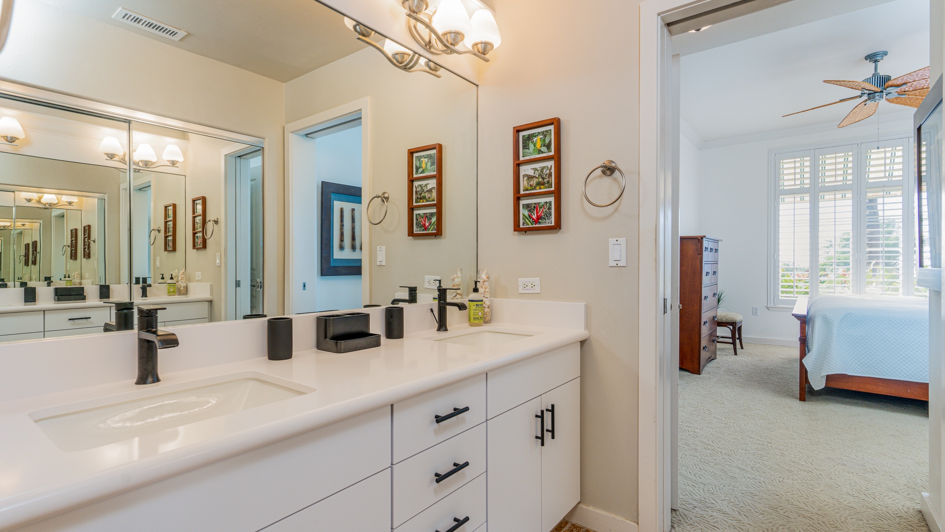 Kapolei Vacation Rentals, Kai Lani 24B - The primary guest bathroom with a double vanity.