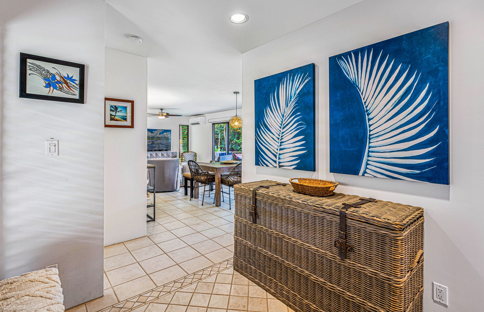 Kihei Vacation Rentals, Wailea Ekolu 1605 - A welcoming entryway with tropical artwork, setting the tone for your island stay.