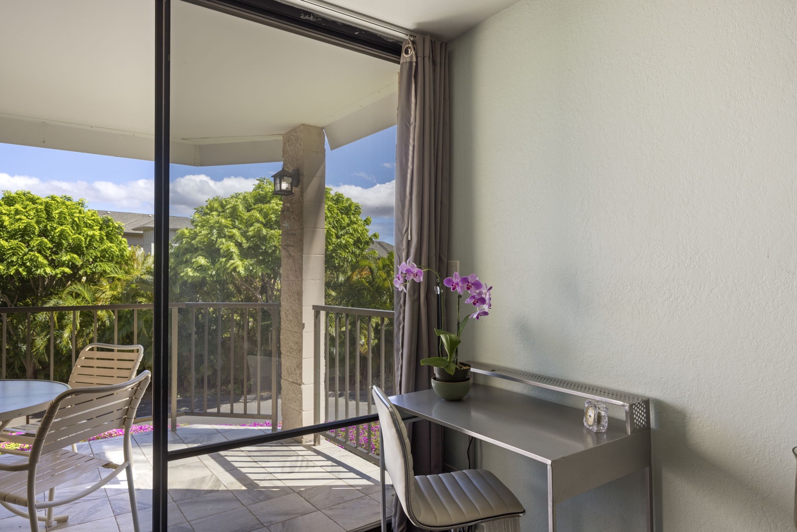 Kihei Vacation Rentals, Kihei Alii Kai C206 - Glass on two sides pulls the garden and the morning light straight into the corner.