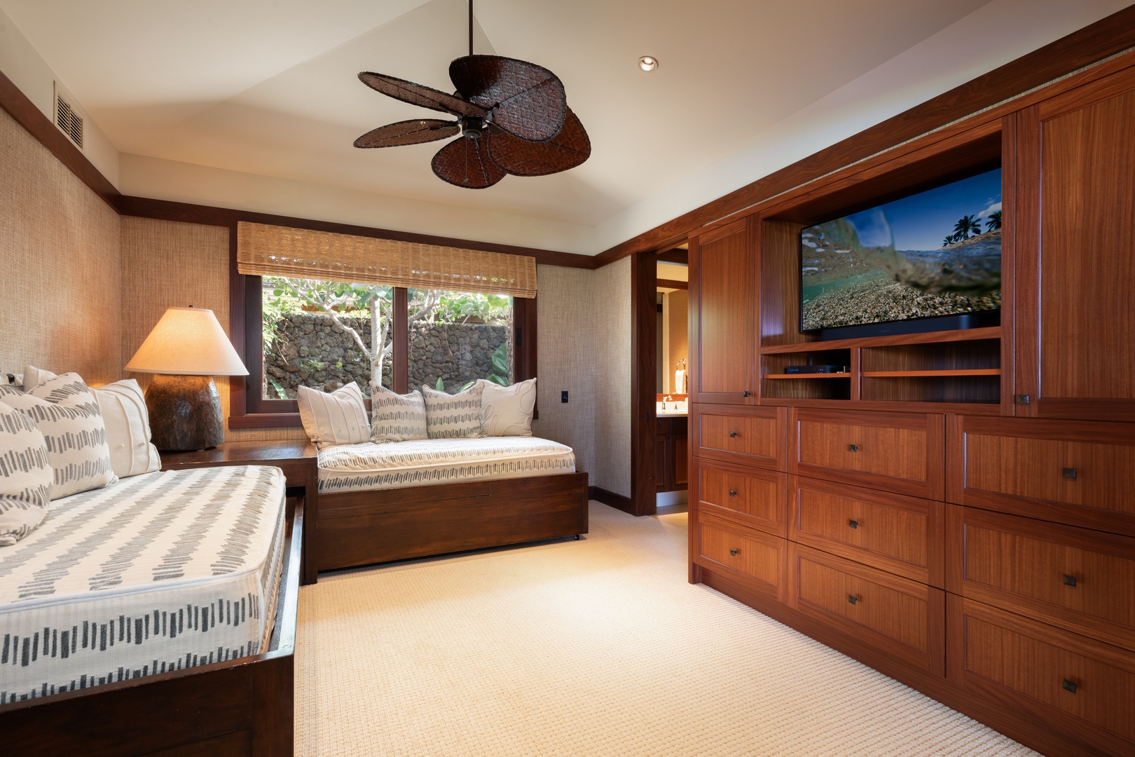 Kailua Kona Vacation Rentals, 5BD Ke Alaula Estate (144) at Hualalai Resort - Guest suite with two twin beds, one trundle bed, and private garden outlook.