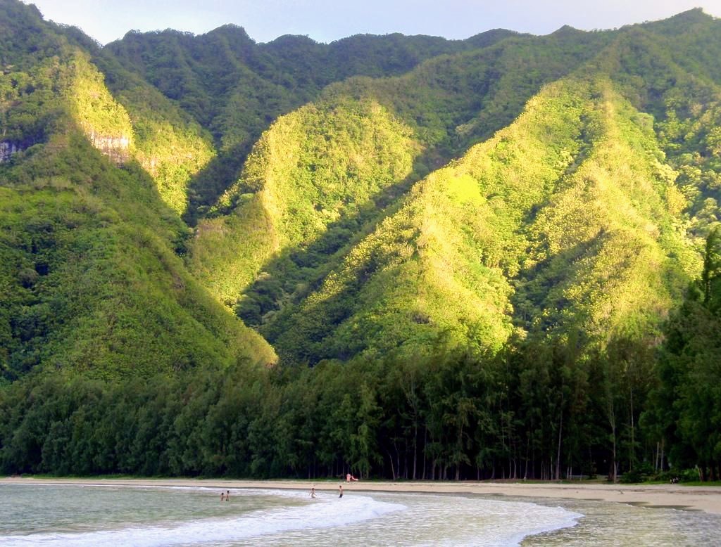 Hauula Vacation Rentals, Private Beach Paradise - Take in the lush Ko?olau mountain ridges rising behind the shoreline, showcasing the rare blend of tropical mountains and beachfront living next to the home.