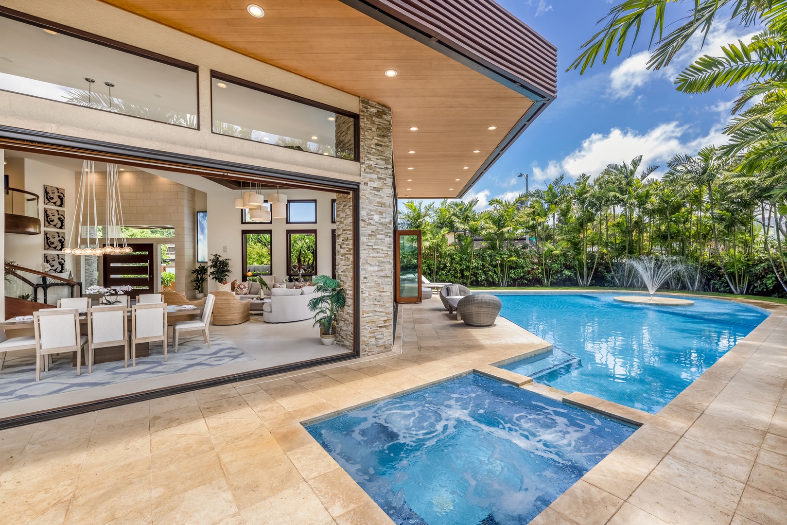 Honolulu Vacation Rentals, Kahala Grand Splendor - Take a refreshing dip in the sparkling pool or relax in the spa, all in a tropical setting.